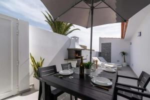 Galeriebild der Unterkunft Bungalow con piscina comunitaria in Chayofa