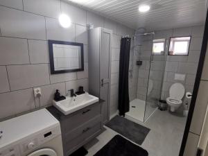 Ein Badezimmer in der Unterkunft Guesthouse Fuik