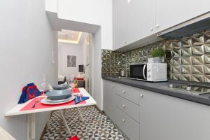 A kitchen or kitchenette at K03 Elitehost Kis Diófa Central