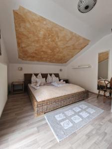 a bedroom with a large bed in a room at Haus Emily in Schladming