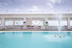 a wedding reception with a fountain in the middle at Green Park Bio Agriturismo in Trentinara