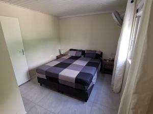 Ein Bett oder Betten in einem Zimmer der Unterkunft Guesthouse Fuik