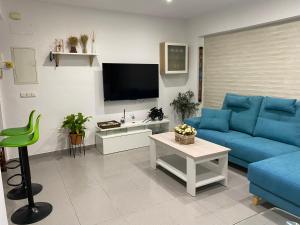 TV a/nebo společenská místnost v ubytování Enmitatiko Alcázar Viejo