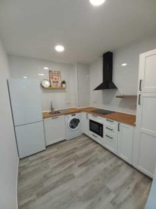 Kuchyň nebo kuchyňský kout v ubytování Nuevo apartamento junto al mar