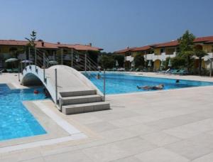 The swimming pool at or close to Enjoy the sun from the garden of our flat