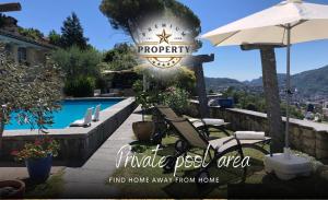 patio con sedie, ombrellone e piscina di SUITE room with private pool area, near COMO lake, private parking I Villa dei Leoni a Morbio Inferiore
