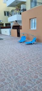 two scooters parked next to a building at Hermes complex1 paralimni in Paralimni
