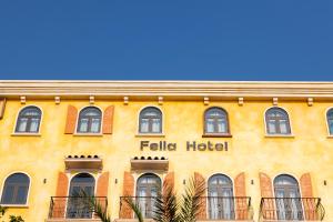 a yellow building with the word felicia hotel on it at Fella Hotel Phu Quoc - Free Hon Thom Island Waterpark Cable Car in Phú Quốc