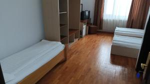Postel nebo postele na pokoji v ubytování Hotel Posada