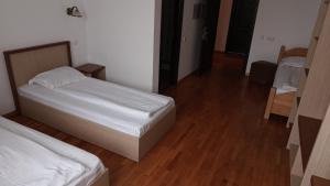 Postel nebo postele na pokoji v ubytování Hotel Posada