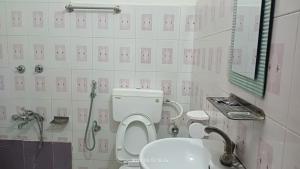 A bathroom at Hotel Butterfly - Peaceful Garden for Nature Lovers