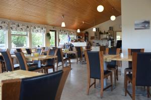 Un restaurant u otro lugar para comer en Gesthus Selfoss