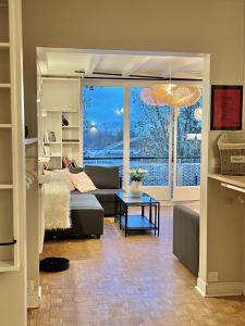 Ένα ή περισσότερα κρεβάτια σε δωμάτιο στο Apartment ParisNicoStay - Cosy 4 bedrooms flat Seine river