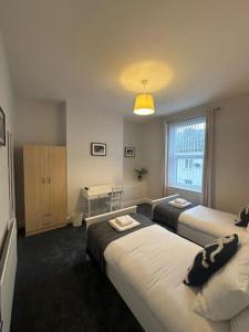 Кровать или кровати в номере 79 Hambledon - 2Bed upstairs flat Blyth