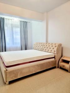 Cama o camas de una habitación en Apartament Aqua - Endless Summer Mamaia Nord Apartaments
