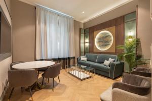 BiBo Suites Palacio de Portago的休息区