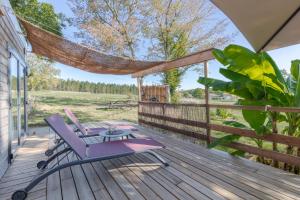 Κήπος έξω από το Tiny House avec SPA, proche de Bordeaux et de Saint-Emilion
