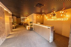 a lobby of a dermatology office with a sign on the wall at The Public Ortakoy in Istanbul