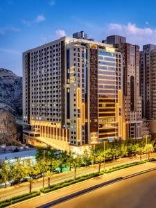 a rendering of a large building in a city at TIME Ruba Hotel & Suites in Mecca