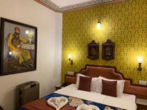 Hotel Pearl Palace Jaipur房間的床