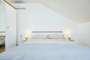 Кровать или кровати в номере Apartment 2Home