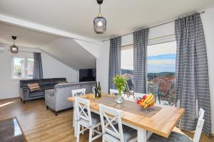 Телевизор и/или развлекательный центр в Apartment 2Home