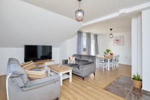 Телевизор и/или развлекательный центр в Apartment 2Home