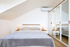 Кровать или кровати в номере Apartment 2Home