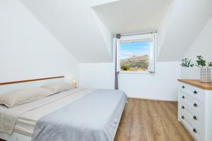 Кровать или кровати в номере Apartment 2Home