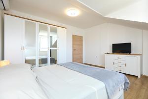Кровать или кровати в номере Apartment 2Home