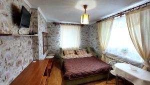 TV a/nebo společenská místnost v ubytování Коттеджный городок Вита -литовская, Голосеевский район, Динамо, Конча-Заспа
