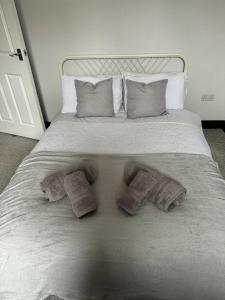 Ένα ή περισσότερα κρεβάτια σε δωμάτιο στο Lowther Apartment - 2 Bedrooms - Sleeps 4