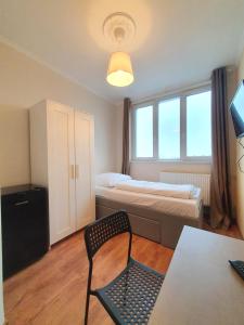 Postel nebo postele na pokoji v ubytování R&B Hotel