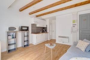 Kuchyň nebo kuchyňský kout v ubytování Ô Merveilleux Compans - Centre ville Toulouse - Wifi, TV + 10 fotografií