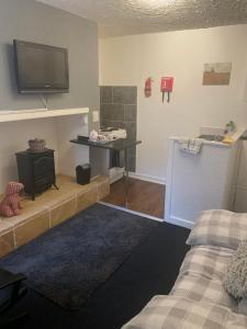 Кровать или кровати в номере Sarnia holiday flats