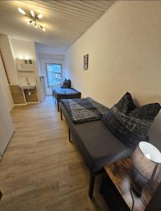 Posezení v ubytování Gästehaus Weißes Lamm - MONTEURZIMMER