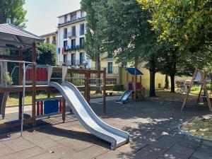 a playground with a slide in a park at EARRA - Casa Fabiola, centro y a 2 min de la playa in Zarautz
