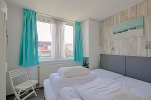 Postel nebo postele na pokoji v ubytování Appartement Seinpost 26 - Callantsoog aan Zee