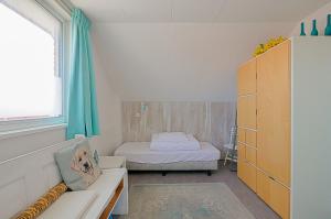 Postel nebo postele na pokoji v ubytování Appartement Seinpost 26 - Callantsoog aan Zee