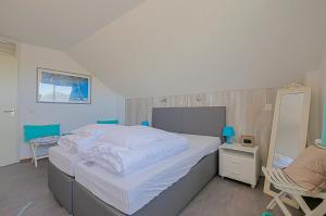 Postel nebo postele na pokoji v ubytování Appartement Seinpost 26 - Callantsoog aan Zee