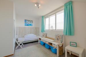Postel nebo postele na pokoji v ubytování Appartement Seinpost 26 - Callantsoog aan Zee