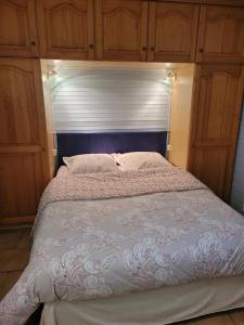 Postel nebo postele na pokoji v ubytování Chambres d’Hôtes Chez Claire