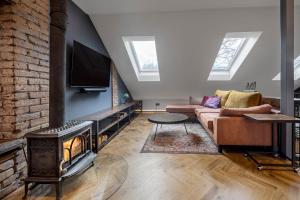 Μια τηλεόραση ή/και κέντρο ψυχαγωγίας στο Cozy Penthouse
