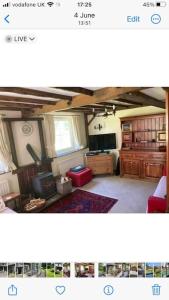 a view of a room with a living room at The Old Smithy, Ullswater in Glenridding