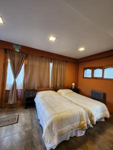 En eller flere senge i et værelse på Entre Montañas