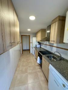 a kitchen with a sink and a counter top at Apartamento Algaida REF.004 in Oropesa del Mar