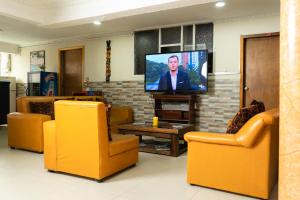 TV a/nebo společenská místnost v ubytování Hotel Juanambu