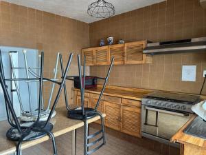 Kuchyň nebo kuchyňský kout v ubytování Casona Luciérnaga-Casa de Huéspedes