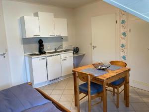 Kuchyň nebo kuchyňský kout v ubytování Appartment Haus Müller