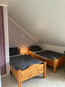 Postel nebo postele na pokoji v ubytování Appartment Haus Müller